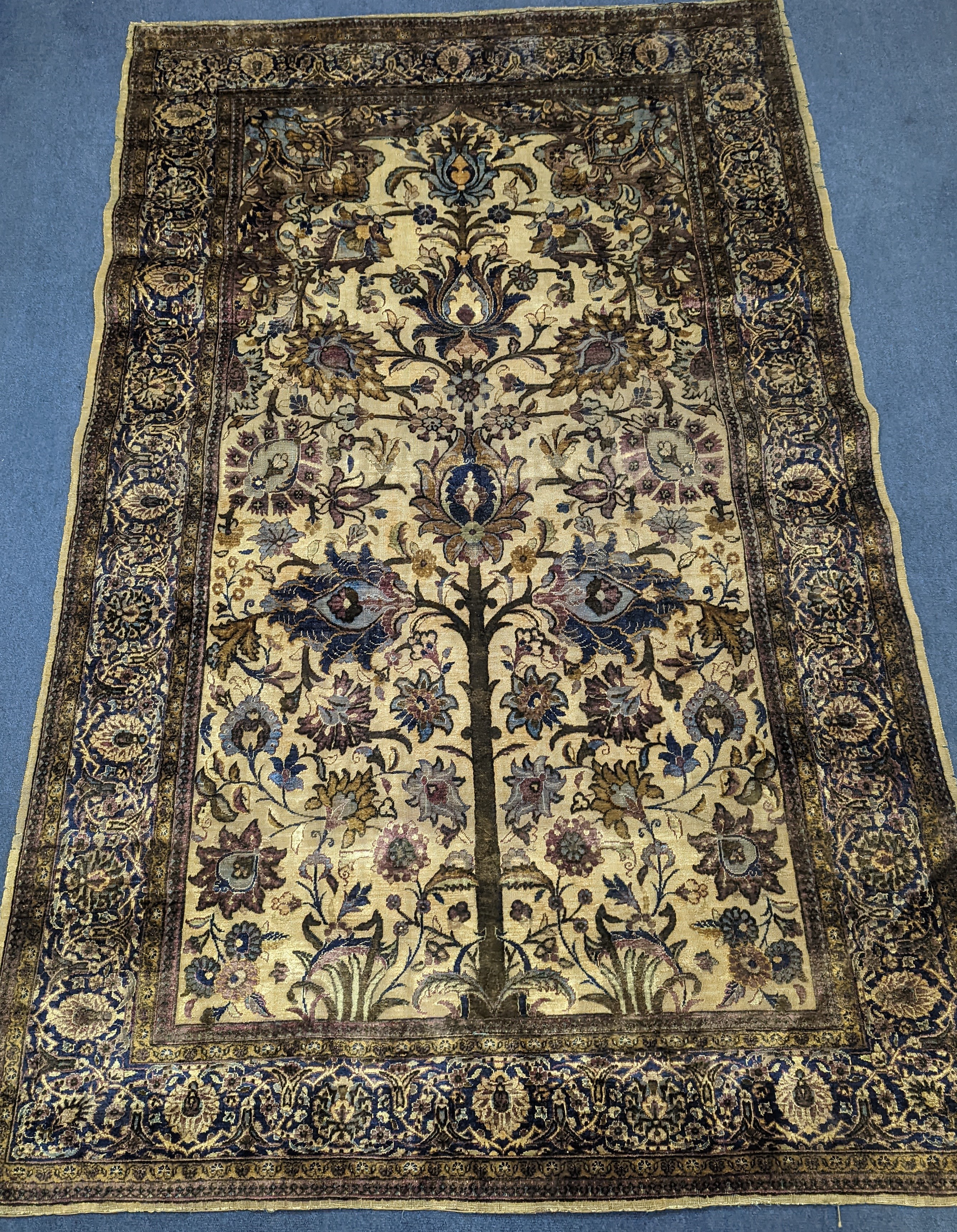A Persian tree of life silk rug, 206 x 128cm